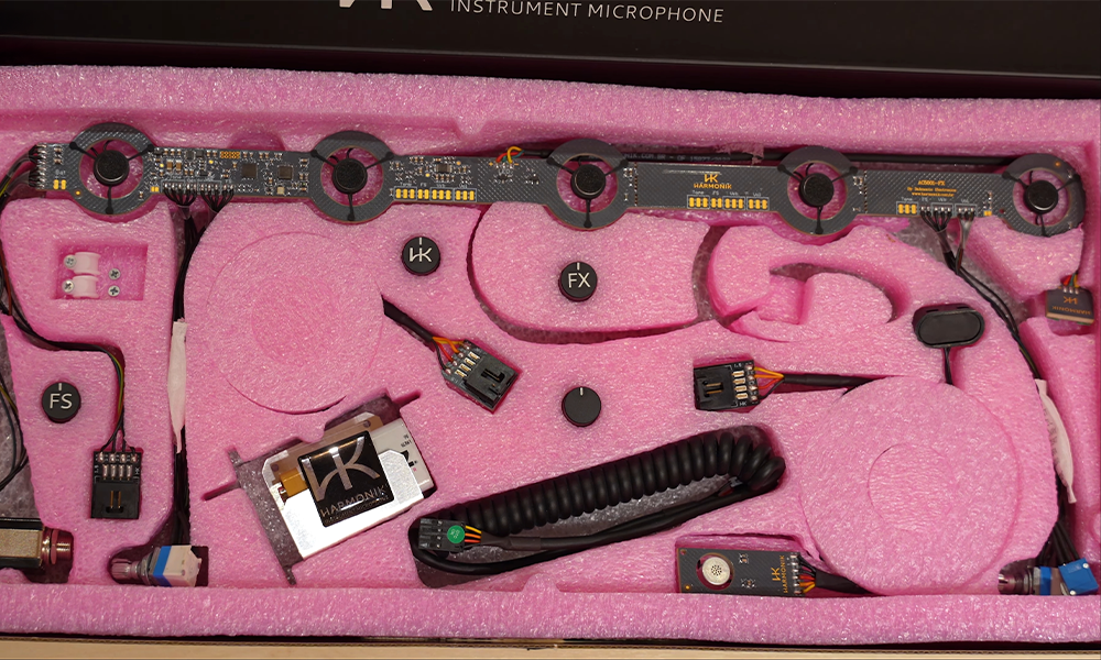 Fotografia ilustrativa de um captador para acordeon com Oitavador e microfonia 